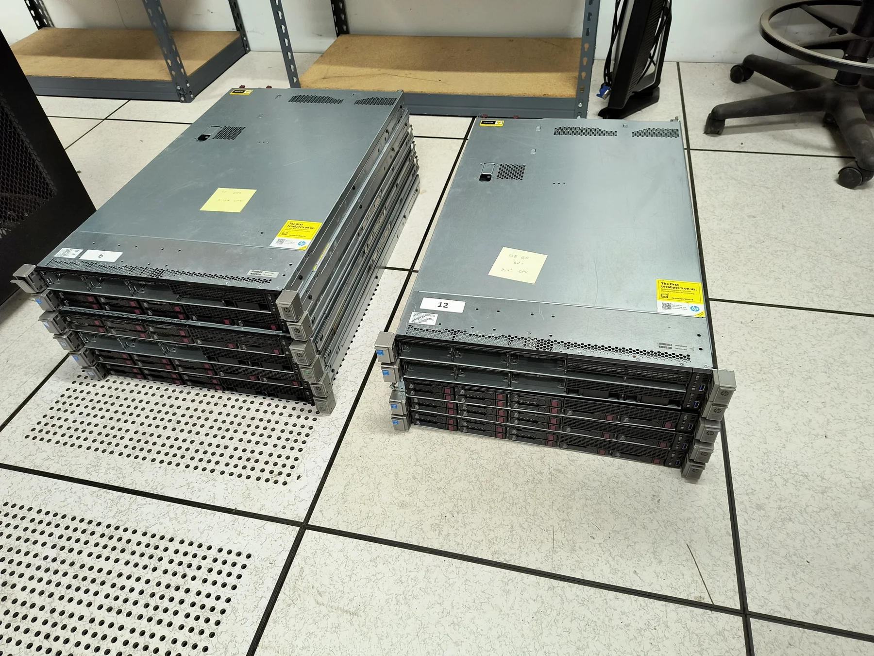 Stacks of rack servers staged before deployment